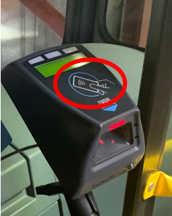 Picture of the console showing a red circle where to tap the smart card