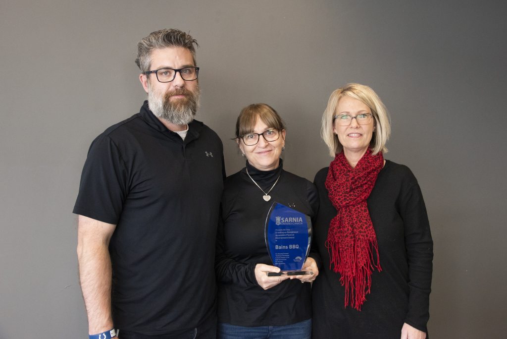 Brendan and Elizabeth Bain of Bains BBQ with SAAC member Heather Allen