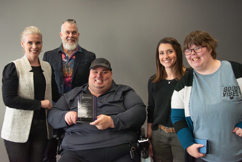 Creating Opportunities for an Accessible Community recipients Vibe Community Connections (VCC). Pictured from left: Sarah Singleton of VCC; Coun. Brian White, Sarnia Accessibility Advisory Committee (SAAC) Council representative; Robert Hughes, SAAC member; and Tina Leonard and Taylor Owens of VCC.